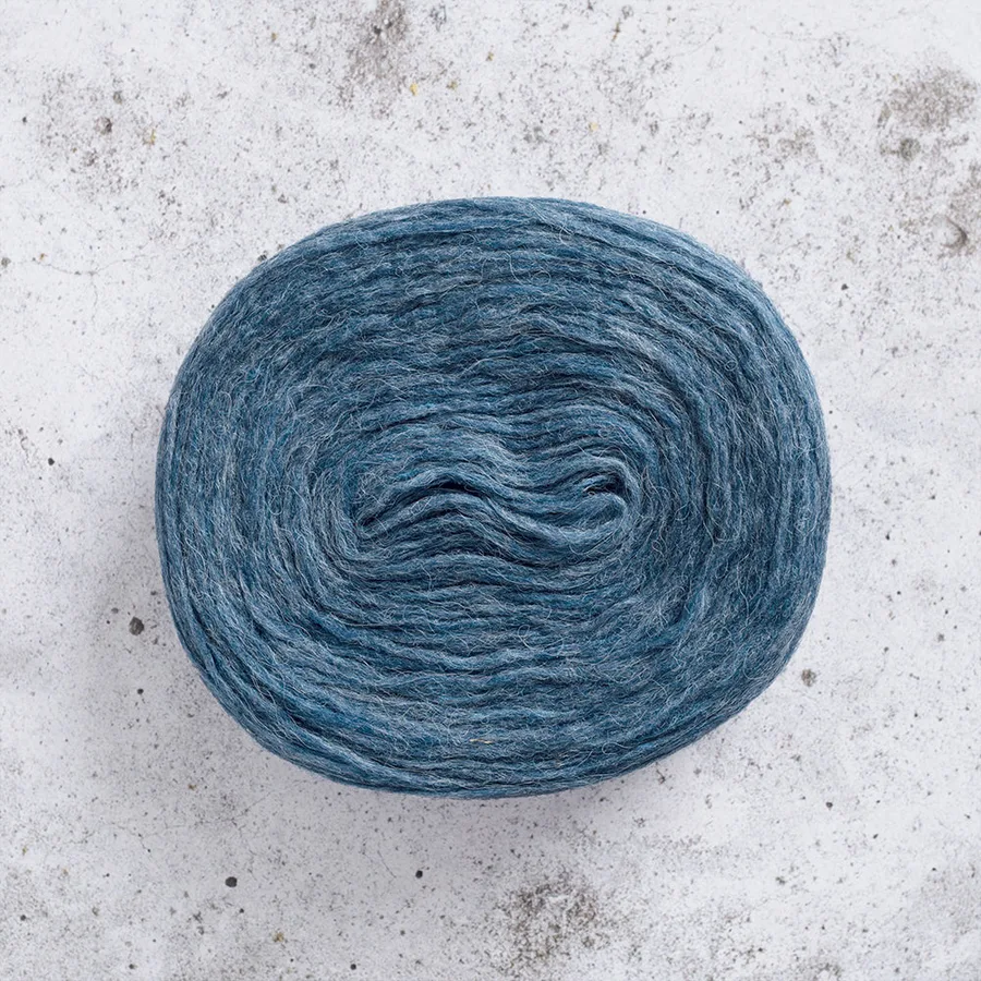 A plate of blue wool yarn from the Knytfolket shop